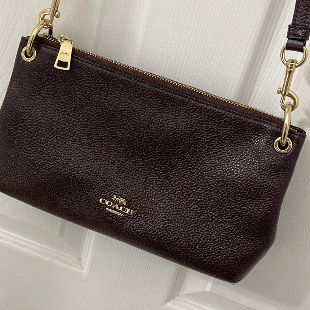Pre owned Coach burgundy sling bag minor used
